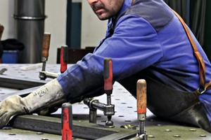  Before welding, the parts are exactly positioned on welding benches 