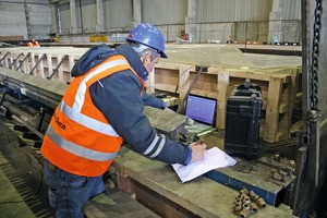  Peter Deegan, ­Technical Director at Banagher Precast ­Concrete, is checking test results recorded for this steel-fiber-­reinforced concrete beam 