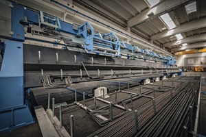  View of the bar stacker with double bender, automatic bending mandrel changer and commissioning trolley 