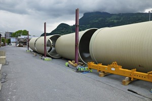  Pressurized pipes for the Rhone Oberwald power plant: a GRP pipe 51 mm thick, 6 m long, and 3 m in diameter was provided with an inner concrete shell 12 cm thick and was subsequently reinforced entirely with synthetic fibers  