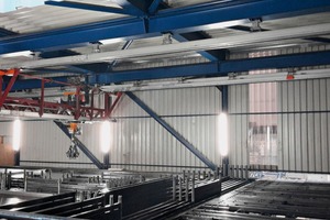  The new Weckenmann magazine robot with the enlarged magazine and the new cycled roller conveyors  