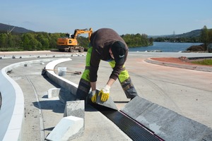  After the glue has been applied, the curbstones are merely tipped over and slightly aligned 