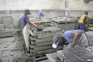  From pouring fresh concrete into the rubber molds … 