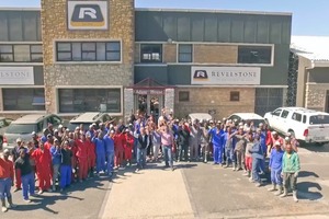  The Revelstone workforce in front of the company building, with managing directors Andrew and Alex Cyprianos pictured in the center 