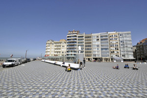  Concrete tiles in various shades of grey were used in the redesign of Rubensplein, another point of attraction on the beach promenade. Here, individual blue tiles add pops of color 