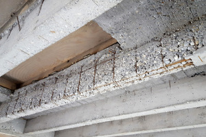  The ribbed concrete floor slabs showed significant damage, including exposed reinforcement  