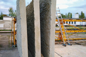  The curved precast elements were stored vertically and held in place by steel frames  