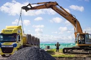  Unloading concrete pipes at Dublin Airport  