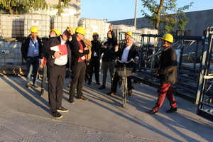  Senior owner-manager Giovanni Zanon (on the bicycle) took pride in personally guiding visitors through his factory. To the left, Gabriele Falchetti, of MCT Italy, the engineering company 