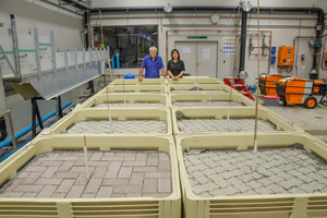  Neil Armitage and civil engineering and permeable paving research student, Kimberly Liu, pose next to the 10 experimental permeable paving cells at UCT Civil Engineering laboratory 