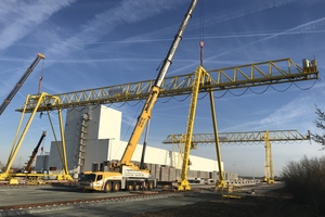  The two, 28 m high sister cranes will operate simultaneously on the storage  