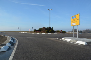  All the curbstones used here to form the curb edging were bonded onto the road surface instead of being conventionally installed 