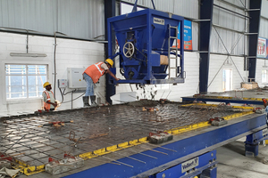  After manual positioning of the shuttering profiles and reinforcement grids, a crane-guided, electrically operated concrete dosing bucket is used to precisely apply the concrete just required 