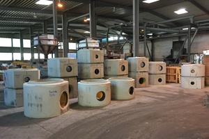 View of the finished manhole base sections with channels made of different materials 