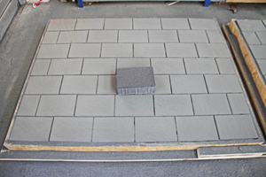  Fig. 6: Discoloration of anthracite pavers caused by the loose joint-filling materials used  