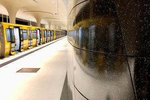  Black-and-white textile-reinforced concrete terrazzo in the new “Rotes Rathaus” subway station 