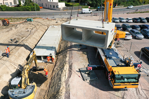  Installation of a stormwater retention channel: The precast reinforced-concrete dual-box units measure 2 × 1,950 × 1,200 / 900 × 2,800 mm 