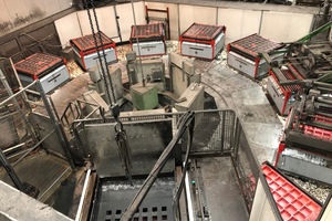 Fig. 3: Wet-cast carousel system for small-sized concrete products: face mix concrete is filled in the multiple mold and core concrete is also filled in 