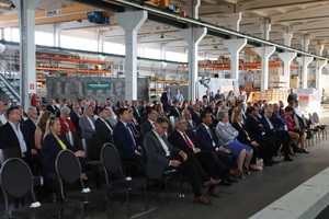  Customers, business partners and representative of industry, culture and politics in the production hall of B.T. innovation GmbH that was converted into a concert hall  