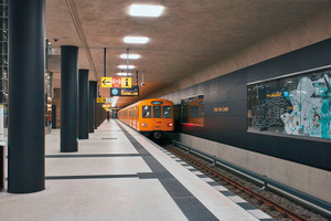  A black pigment was added to the concrete used for the black stripes for dividing the platforms 