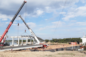  The Grove  GMK  6220 crane positioned on the barge on the Tebicuary River  