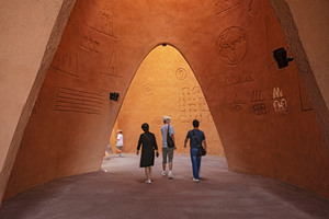  The clay walls are adorned by carved pictograms with animations projected onto them 