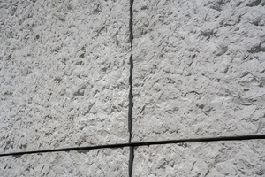  The surface finish of the concrete simulates hewn granite 