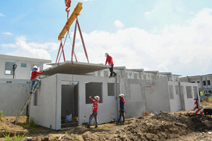  The precast elements used are 100 mm thick solid walls all around both floors as per the minimum code requirement. The 120 mm solid slabs are provided in a single piece  