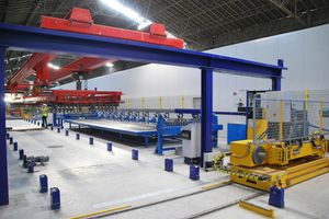  <div class="bildtext_en">Once the wire bundles have been inserted into the beam molds, the tensioning machine hydraulically prestresses the suspended steel wires</div> 