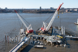  Driving the 267 prestressed concrete piles into the riverbed  