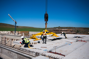  A hollow-core slab being lowered into position 