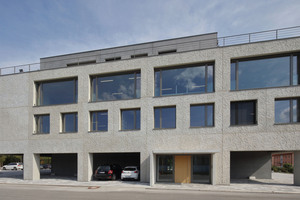  The entrance to the building is on the west side. The building is surrounded by a carport gallery 