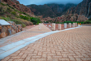  A newly completed layby entrance and sidewalk installation paved with C.E.L.’s Brownstone exposed aggregate pavers 