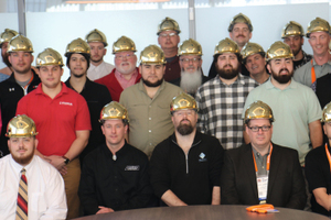  A record-number 63 men and women received their gold hard hats and graduation certificates as they became Master Precasters 