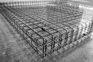  Fig.1: Non-metallic reinforcement cage made of a CFRP grid formed in a ­thermoplastic process  