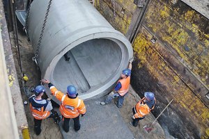  Fig. 1: Placing a precast concrete sewer 