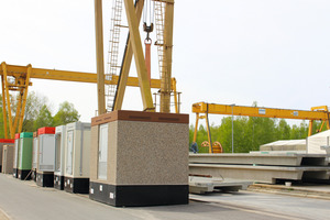  View of the external grounds – here self-supporting prefabricated smodular buildings (left) and Double Tee floor slabs (right) 