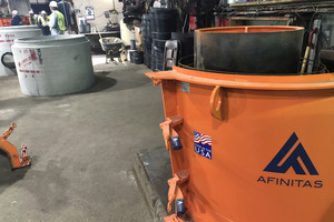  Front right an example of the production equipment (in this case from the US American supplier Afinitas) and at the back left finished concrete manhole components  