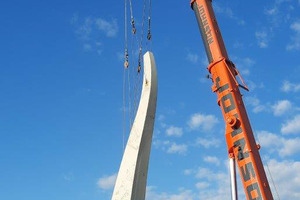  Workers attached the two pylon sections using the Peikko bolting system 