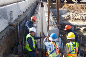  The second beam in Phase 1 is lowered into position onto the first abutment lift  