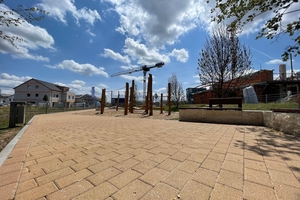  The pavement in the color shade of sandstone yellow creates a beautiful ambiance for the playground 