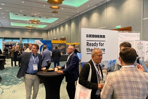  The accompanying trade exhibition was also well attended; here the booth of Liebherr … 