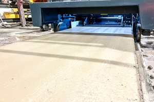  The concrete is directly compressed into the production beds and remains behind the machine to cure  