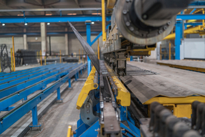  The beam bending system can automatically change bending dies during  
