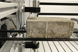  Transmission test of a test specimen made of concrete for cracks, shrinkage holes or inclusions as a preliminary step of in-line testing  