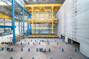  Supported by Green Code Curing Control, the automated storage and retrieval unit conveys the elements to the effective curing process  
