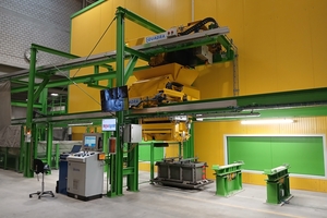  View of the two filling stations with the remote skip feeding the concrete dosing hopper on load cells 