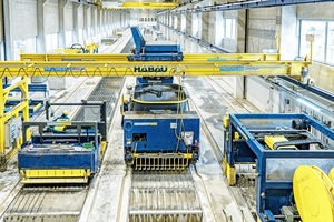  The 2.4 m wide casting beds allow for the manufacture of a wide variety of products, including the simultaneous production of two 1.2 m wide floor slabs on the same casting bed  