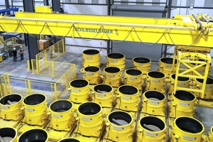  Automated wetcast production of manhole bottoms of different geometries; mold manipulation by automatic crane 