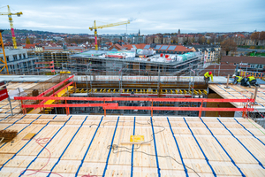  The planners relocated the escape and rescue routes as circumferential balconies over two building structures and over all floors 